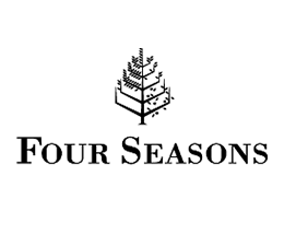 Black and white Four Seasons logo featuring a stylized tree above the words "FOUR SEASONS" in bold, capital letters.